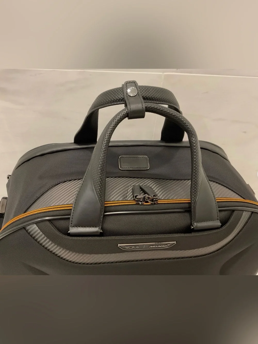 NEW Tumi McLaren QUANTUM 21.5” Duffel Bag - BLACK with PAPAYA ORANGE Accents